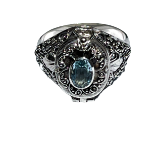 Sterling Silver Bali Handmade Poison Ring with a 5x7 blue Topaz Gemstone